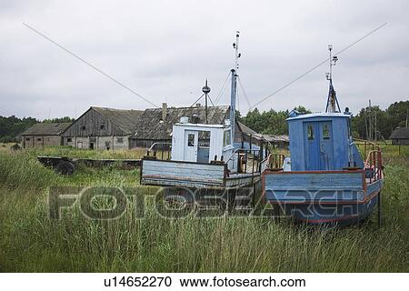 Stock Image - Calm, Fishing Boat, Day, Coast, Agriculture. Fotosearch