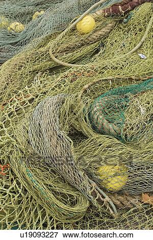 Stock Photo - Close-Up, Fishing Net, Interlock, Intertwined. Fotosearch