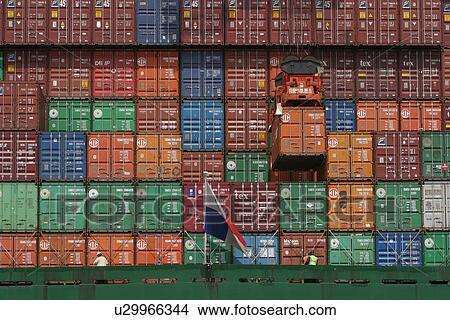 Picture - flag, machine, crane, loading, pulling, lifting. Fotosearch