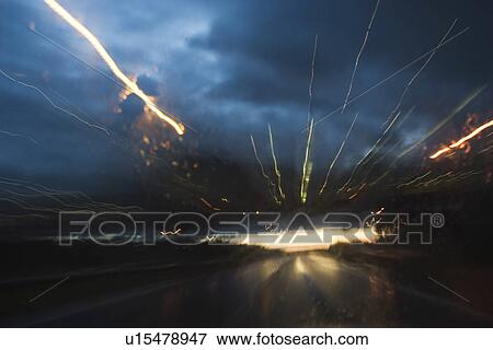 Stock Photo - Clouds, Dark, Flash, Glow. Fotosearch