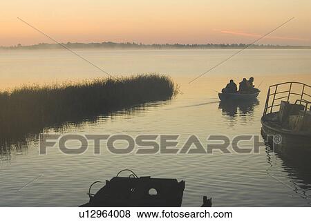Boat, Dusk, Fog, Grass View Large Photo Image Stock Photo - Boat, Dusk, Fog, Grass. Fotosearch