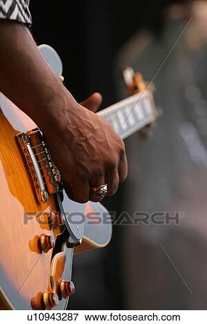Stock Photo - band, musical, instrument, work, guitar, musician. Fotosearch