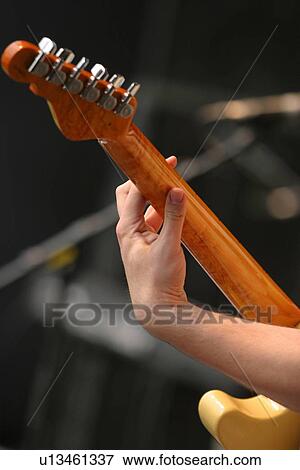 Stock Photo - band, musical, instrument, work, guitar, musician. Fotosearch