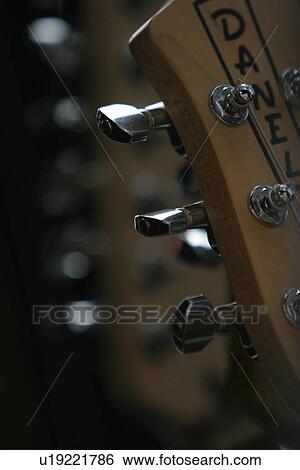 Stock Photograph - band, musical, instrument, work, guitar, musician. Fotosearch