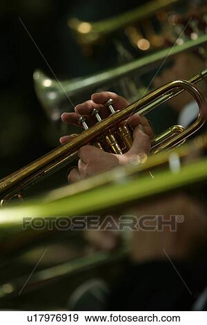 Stock Photo - Clarinet, Background, Brass Instrument, Brass Band, Brass, Accessory. Fotosearch
