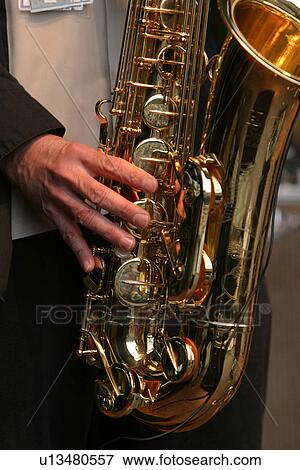 horn, hands, saxophone, music, device, harmonious View Large Photo Image Stock Photo - horn, hands, saxophone, music, device, harmonious. Fotosearch