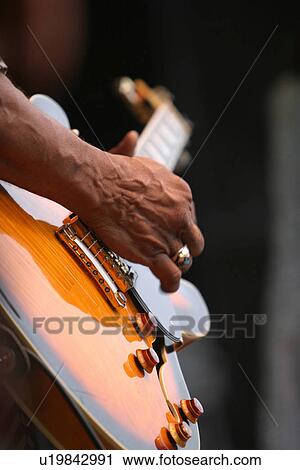 Stock Image - performance, performing, band, musical, instrument, work. Fotosearch