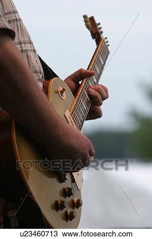Stock Image - performance, performing, band, musical, instrument, work. Fotosearch