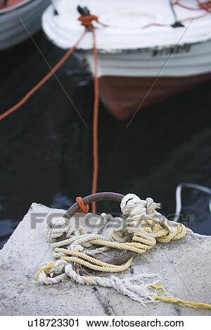 Stock Image - Attached, Floating, Climate, Boat, Anchored. Fotosearch