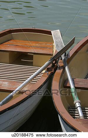 Stock Photography - pier, row, boats, moored, tethered, wooden. Fotosearch