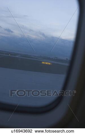 Stock Image - clouds, horizon, sky, scenic, calm, window. Fotosearch