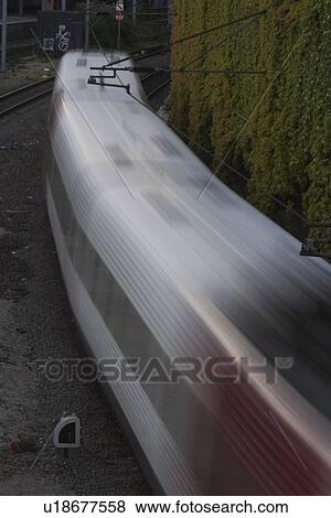 Stock Photo - Commute, Commuter, Conveyance, Day, Electric Train. Fotosearch