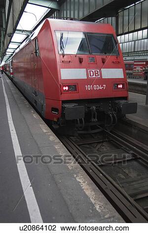 Stock Image - rail, fast, speed, red, travel, commute. Fotosearch