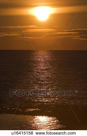 Stock Photo - Calm, Clouds, Dawn, Day, Dusk. Fotosearch
