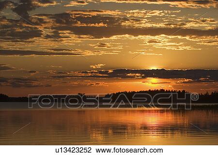 Stock Image - Calm, Clouds, Dawn, Dusk, Environment. Fotosearch