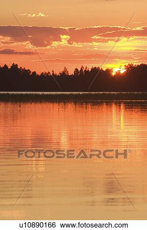Stock Photograph - Calm, Clouds, Dawn, Dusk, Environment. Fotosearch