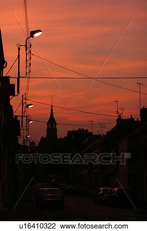 Stock Image - dark, dusk, dawn, twilight, gloomy, lit. Fotosearch
