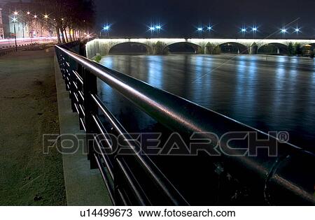 Stock Image - night, dark, darkness, railing, rail, safety rail. Fotosearch