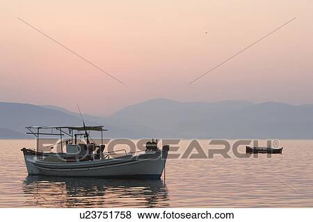 Stock Photo - Boat, Horizon, Generic Location, Anchored. Fotosearch