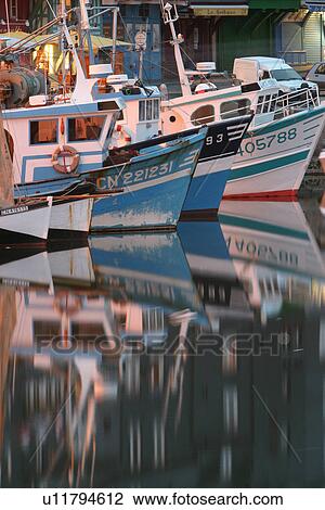 Stock Image - Boats, Calm, Clear Water, Climate, Coast. Fotosearch