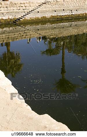Stock Photo - Brick Wall, Outdoors, Group Of People, Day, Ancient. Fotosearch