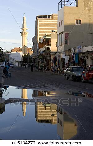 Stock Photo - Building Exterior, Building Structure, Car, Day, Group Of People. Fotosearch