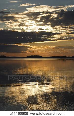 Stock Photography - Calm, Clouds, Dawn, Day, Dusk. Fotosearch