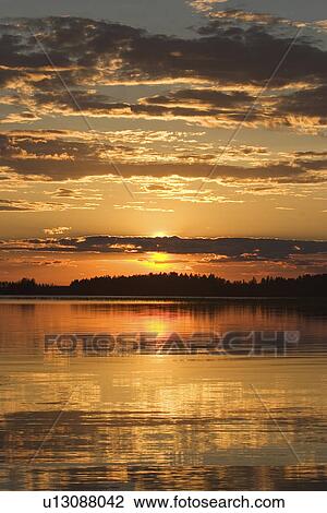 Stock Image - Calm, Clouds, Dawn, Dusk, Environment. Fotosearch