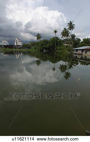 clouded, clouds, river, water, reflection, trees View Large Photo Image Picture - clouded, clouds, river, water, reflection, trees. Fotosearch