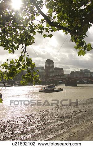 Stock Image - Cloud, Boat, Building Structure, Building Exterior, Branch, Arch Bridge. Fotosearch
