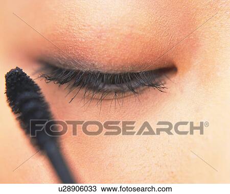 A Woman Applying Mascara, Front View, Differential Focus View Large Photo Image Stock Image - A Woman Applying Mascara, Front View, Differential Focus. Fotosearch