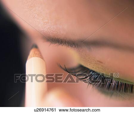 A Woman Penciling Eyebrow, High Angle View, Differential Focus View Large Photo Image Stock Image - A Woman Penciling Eyebrow, High Angle View, Differential Focus. Fotosearch