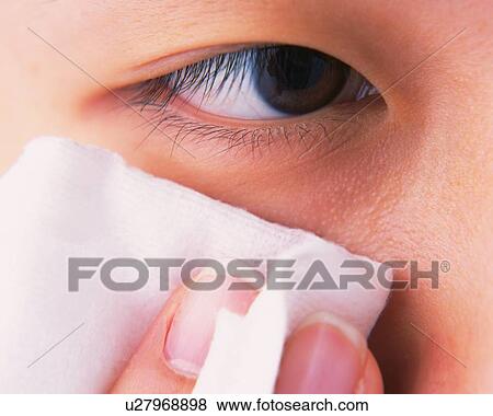 A Woman Removing Makeup with a Cotton, Front View, Differential Focus View Large Photo Image Stock Photo - A Woman Removing Makeup with a Cotton, Front View, Differential Focus. Fotosearch