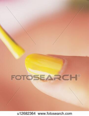 Closed Up Image of a Finger Nail Having a Yellow-Colored Manicure, Differential Focus View Large Photo Image Picture - Closed Up Image of a Finger Nail Having a Yellow-Colored Manicure, Differential Focus. Fotosearch