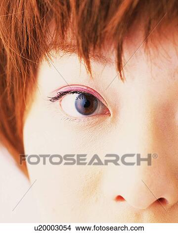 Closed Up Image of a Woman Face Wearing Pink-Colored Eye Shadow, Front View, Looking at Camera, Differential Focus View Large Photo Image Picture - Closed Up Image of a Woman Face Wearing Pink-Colored Eye Shadow, Front View, Looking at Camera, Differential Focus. Fotosearch