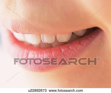 Stock Image - Closed Up Image of Feminine Lips, Differential Focus. Fotosearch