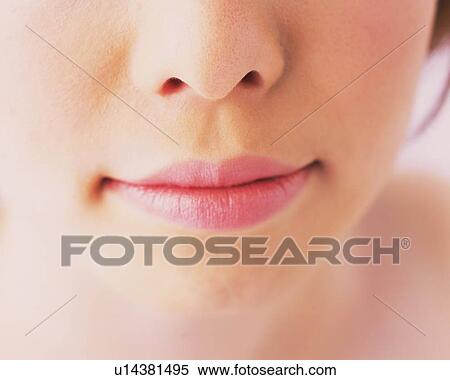 Stock Photography - Part of Woman Face, Nose and Mouth, Differential Focus. Fotosearch