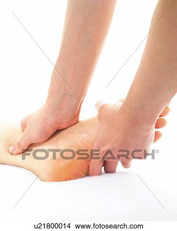 Aesthetician Who Massages Bottom of Woman's Foot, Close Up View Large Photo Image Picture - Aesthetician Who Massages Bottom of Woman's Foot, Close Up. Fotosearch
