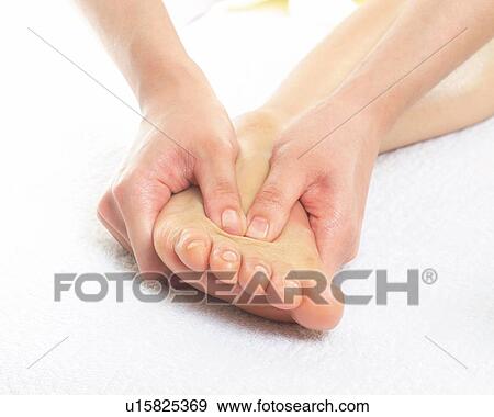 Aesthetician Who Massages Bottom of Woman's Foot, Close Up View Large Photo Image Stock Photo - Aesthetician Who Massages Bottom of Woman's Foot, Close Up. Fotosearch