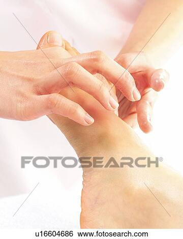 Aesthetician Who Massages Bottom of Woman's Foot, Close Up View Large Photo Image Stock Photograph - Aesthetician Who Massages Bottom of Woman's Foot, Close Up. Fotosearch