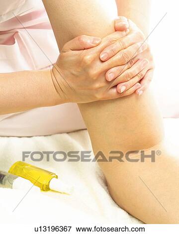 Aesthetician Who Massages Woman's Calf of Leg, Close Up View Large Photo Image Stock Photo - Aesthetician Who Massages Woman's Calf of Leg, Close Up. Fotosearch