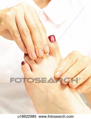 Aesthetician Who Massages Woman's Foot, Close Up View Large Photo Image Stock Photography - Aesthetician Who Massages Woman's Foot, Close Up. Fotosearch