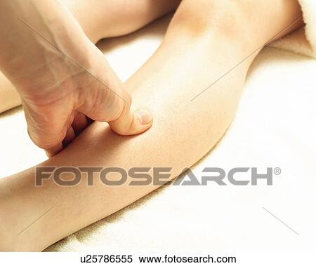 Stock Photography - Aesthetician Who Massages Woman's Foot, Close Up. Fotosearch