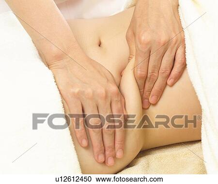 Aesthetician Who Massages Woman's Stomach View Large Photo Image Stock Image - Aesthetician Who Massages Woman's Stomach. Fotosearch