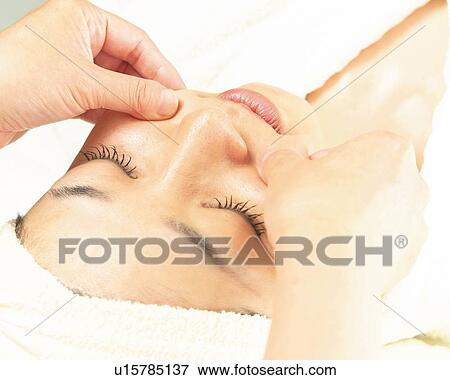 Stock Photo - Facial Massage, High Angle View. Fotosearch