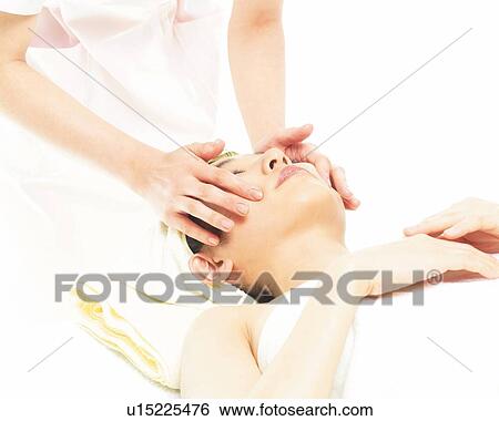 Stock Photograph - Facial Massage, High Angle View. Fotosearch
