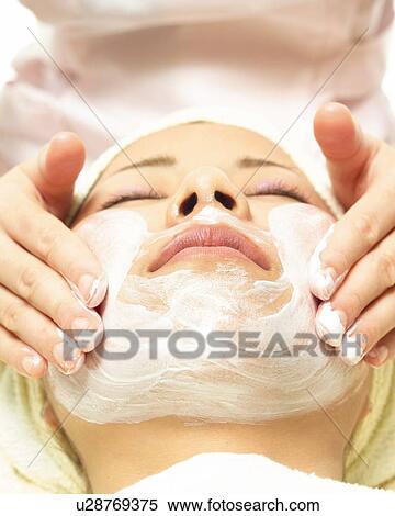 Stock Photography - Facial Massage, High Angle View. Fotosearch