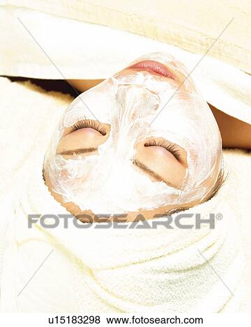 Stock Photo - Woman Who Does Face Masks, High Angle View. Fotosearch