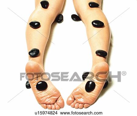 Woman's Foot and Stones, High Angle View View Large Photo Image Picture - Woman's Foot and Stones, High Angle View. Fotosearch
