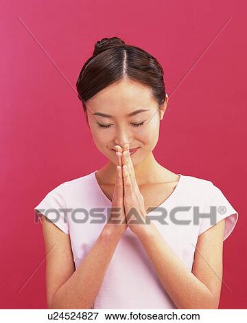 Praying Young Woman, Front View View Large Photo Image Stock Photo - Praying Young Woman, Front View . Fotosearch